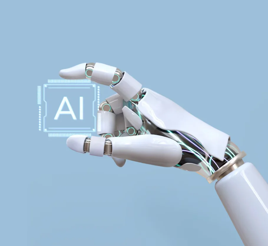 Un bras robotique tient dans la main une micro-puce sur laquelle est inscrit Intelligence Artificielle (IA) 